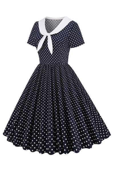 Vintage Zwart-Witte Polka Dot Jurk Met Vlinderdas