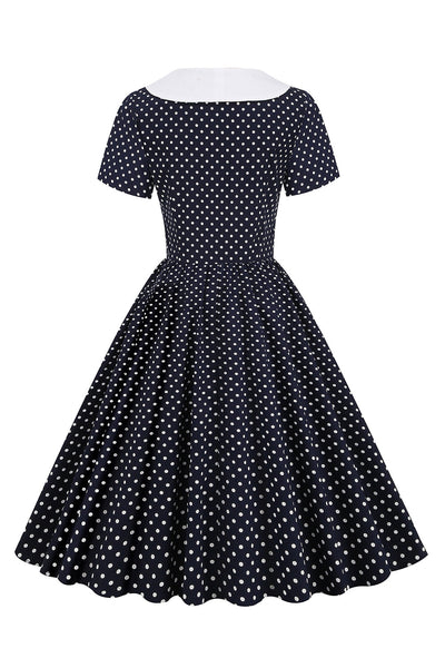 Vintage Zwart-Witte Polka Dot Jurk Met Vlinderdas